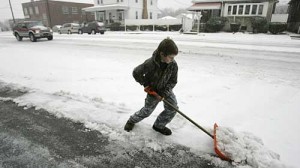 Boy Shoveling Snow